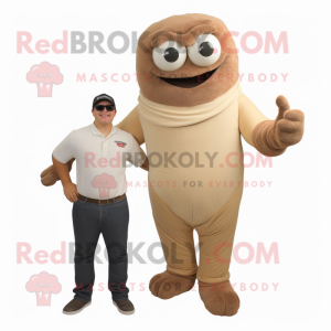 Tan Cyclops mascot costume character dressed with a Henley Tee and Ties