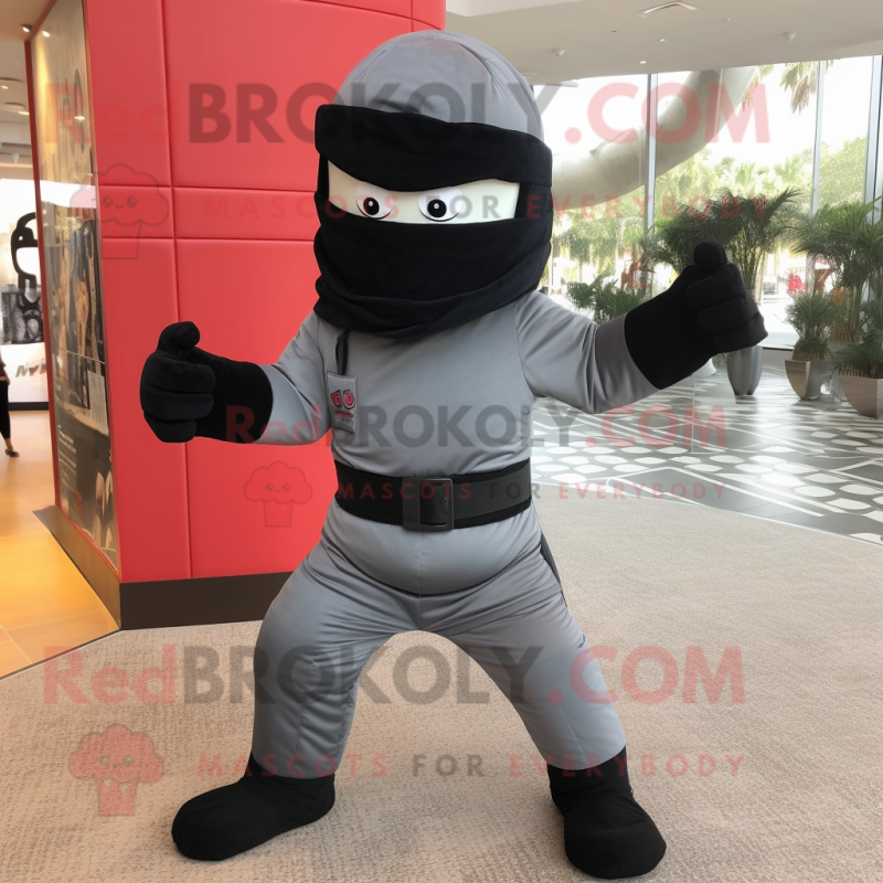 Gray Ninja mascot costume character dressed with a Jeggings and Cufflinks