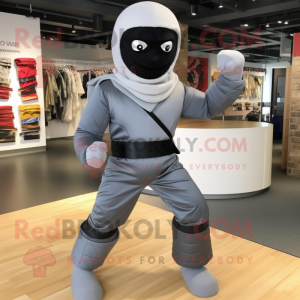 Gray Ninja mascot costume character dressed with a Jeggings and Cufflinks