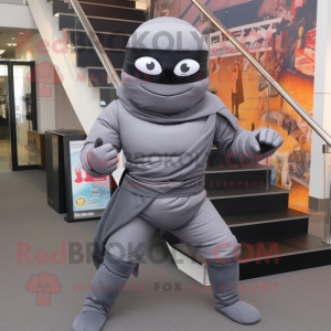 Gray Ninja mascot costume character dressed with a Jeggings and Cufflinks