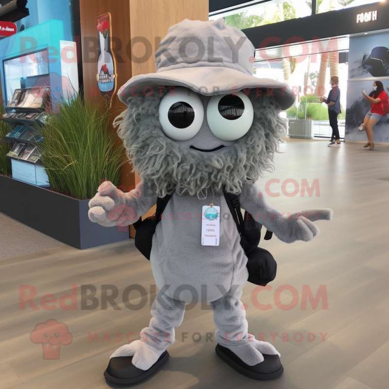 Gray Fried Calamari mascot costume character dressed with a Romper and Backpacks