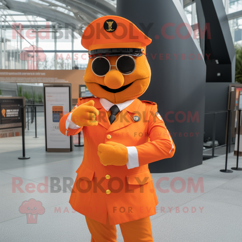 Orange Soldier mascot costume character dressed with a Suit and Pocket squares Orange Soldier mascot costume character dressed with a Suit and Pocket squares