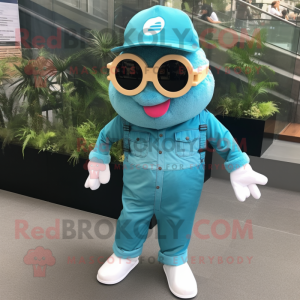 Turquoise Cod mascot costume character dressed with a Overalls and Sunglasses