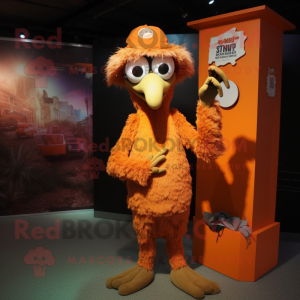Orange Ostrich mascot costume character dressed with a Cover-up and Beanies