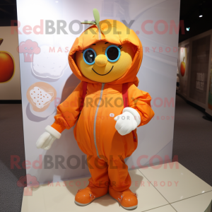 Orange Apple mascot costume character dressed with a Parka and Messenger bags