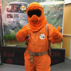 Orange Special Air Service mascot costume character dressed with a Long Sleeve Tee and Scarves