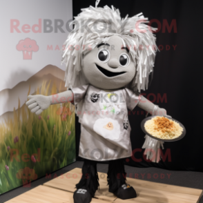 Silver Pad Thai mascot costume character dressed with a Graphic Tee and Hair clips