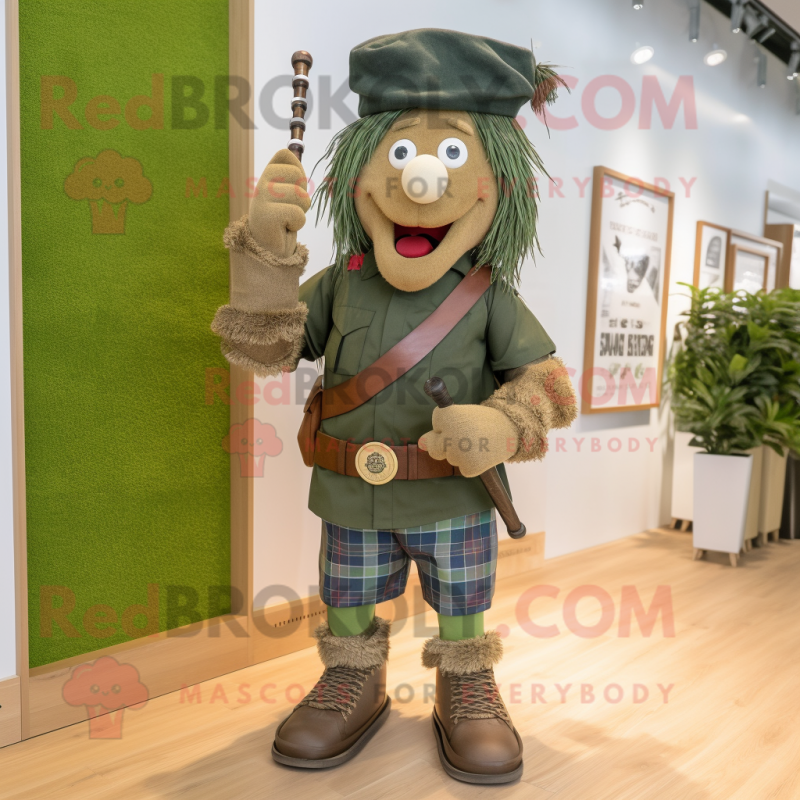 Olive Bagpipe mascot costume character dressed with a Denim Shorts and Berets Olive Bagpipe mascot costume character dressed with a Denim Shorts and Berets