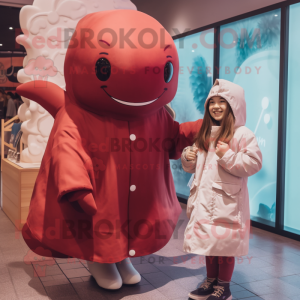 Maroon Beluga Whale mascot costume character dressed with a Raincoat and Mittens