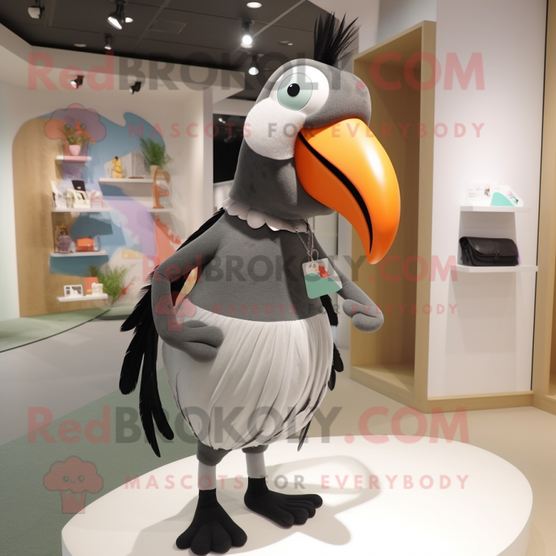 Gray Toucan mascot costume character dressed with a Mini Skirt and Hair clips