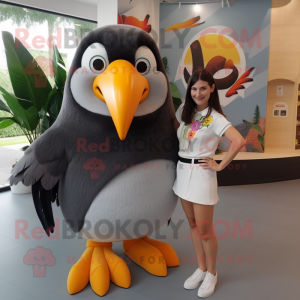 Gray Toucan mascot costume character dressed with a Mini Skirt and Hair clips