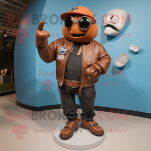 Rust Baseball Glove mascot costume character dressed with a Leather Jacket and Shoe clips