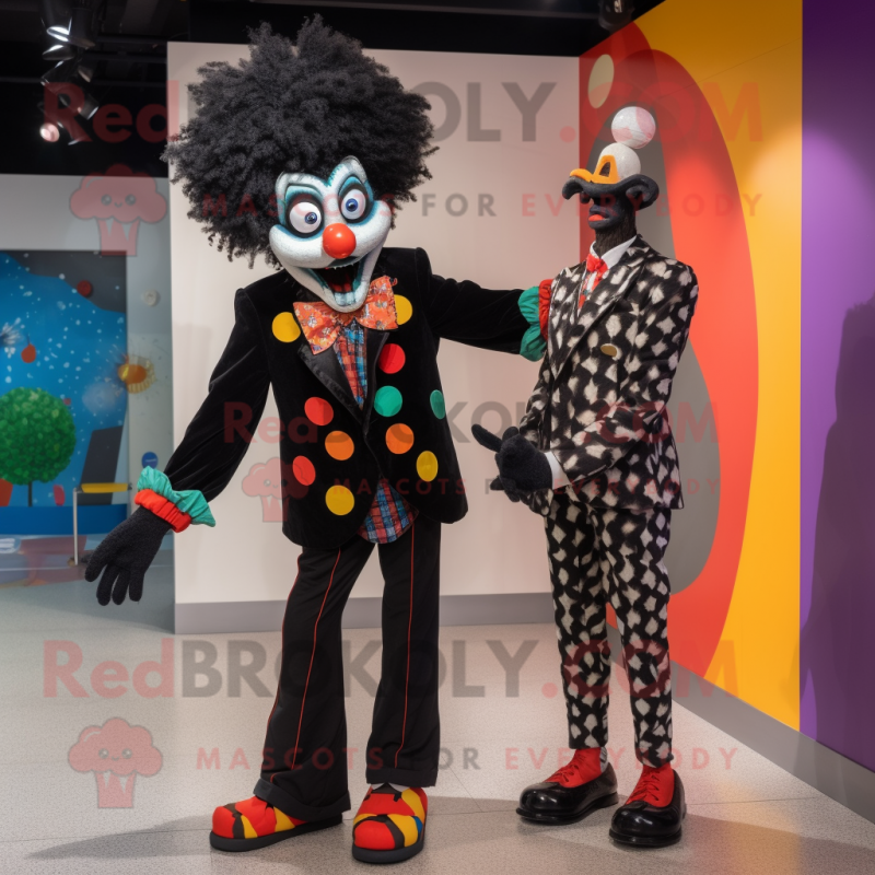 Black Clown mascot costume character dressed with a Jacket and Brooches Black Clown mascot costume character dressed with a Jacket and Brooches