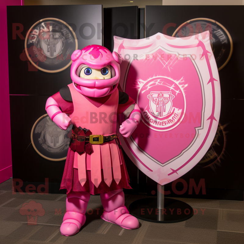 Pink Celtic Shield mascot costume character dressed with a Rash Guard and Ties Pink Celtic Shield mascot costume character dressed with a Rash Guard and Ties