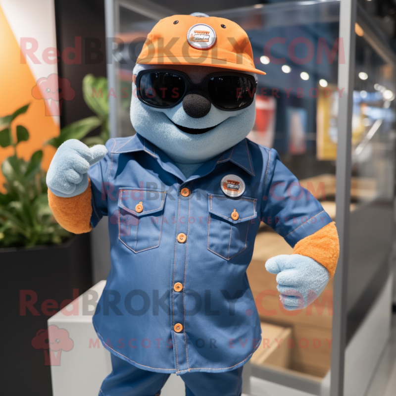 Orange Navy Seal mascot costume character dressed with a Denim Shorts and Cufflinks Orange Navy Seal mascot costume character dressed with a Denim Shorts and Cufflinks