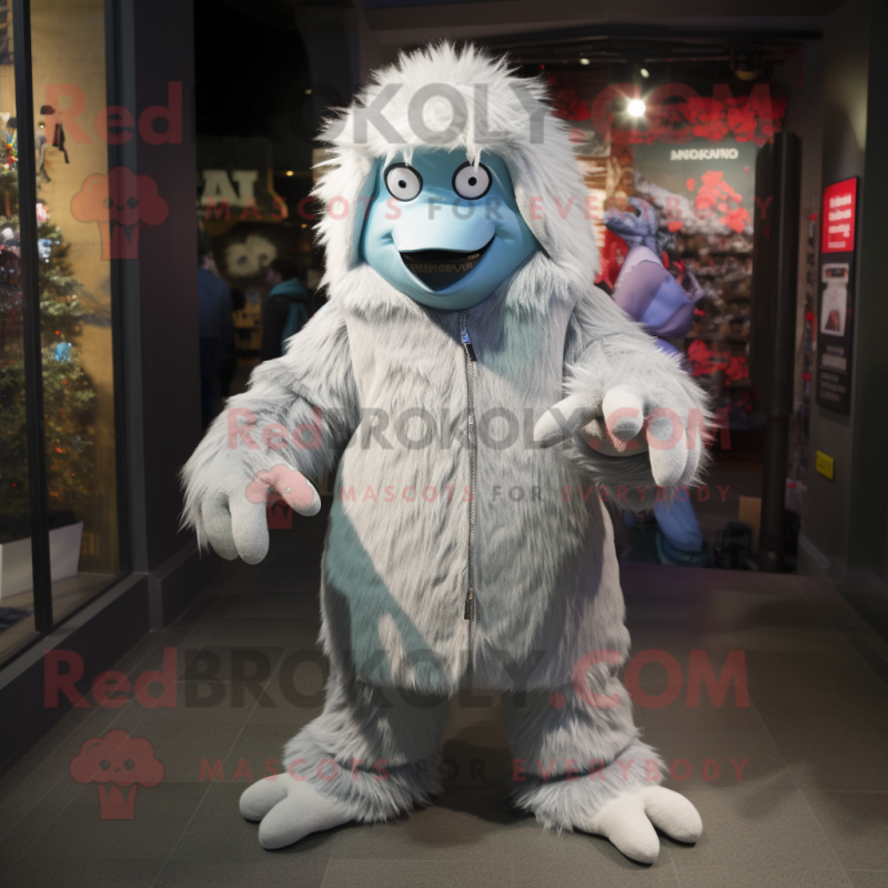 Silver Yeti mascot costume character dressed with a Chinos and Beanies Silver Yeti mascot costume character dressed with a Chinos and Beanies