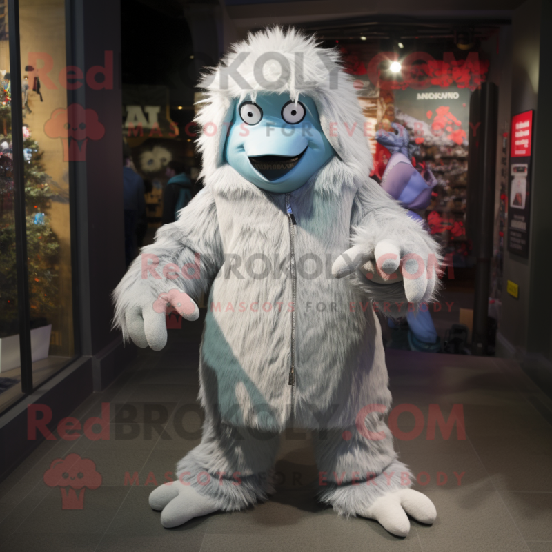 Silver Yeti mascot costume character dressed with a Chinos and Beanies