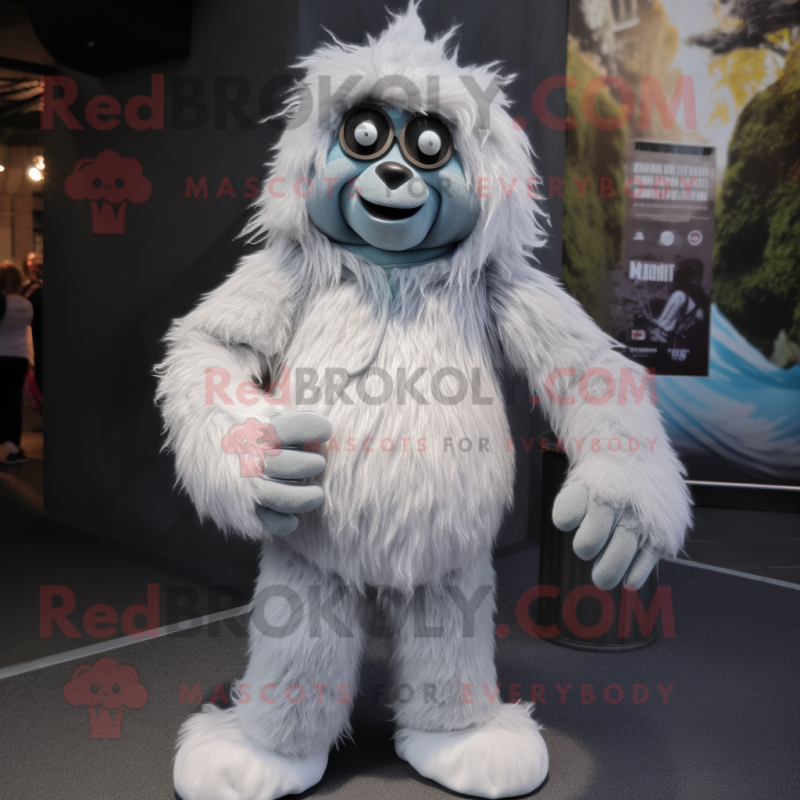 Silver Yeti mascot costume character dressed with a Chinos and Beanies