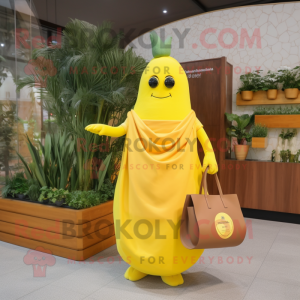 Yellow Zucchini mascot costume character dressed with a Empire Waist Dress and Tote bags