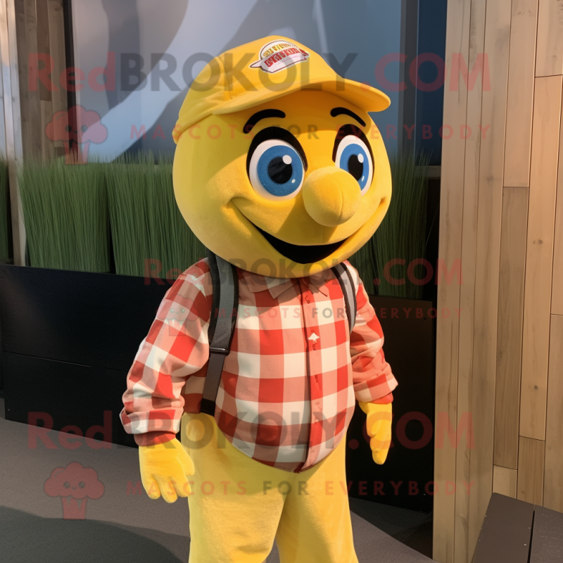 Lemon Yellow Clown Fish mascot costume character dressed with a Flannel Shirt and Caps