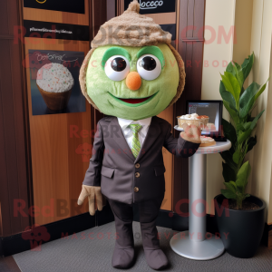 Olive Cupcake mascot costume character dressed with a Blazer and Wraps