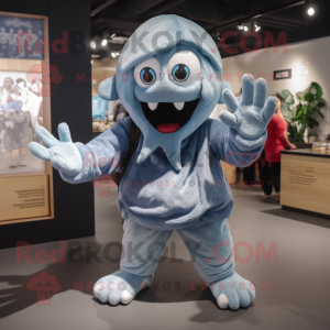 Silver Kraken mascot costume character dressed with a Denim Shorts and Mittens