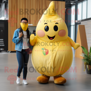 Gold Pear mascot costume character dressed with a Boyfriend Jeans and Bracelets