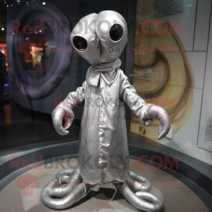 Silver Hydra mascot costume character dressed with a Raincoat and Keychains