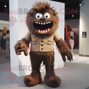 Brown Demon mascot costume character dressed with a Chinos and Lapel pins