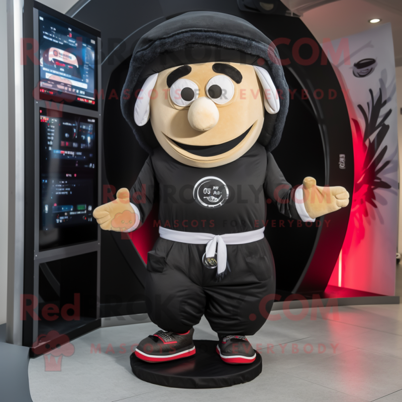Black Gyro mascot costume character dressed with a Joggers and Headbands Black Gyro mascot costume character dressed with a Joggers and Headbands