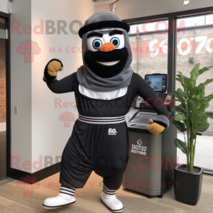 Black Gyro mascot costume character dressed with a Joggers and Headbands