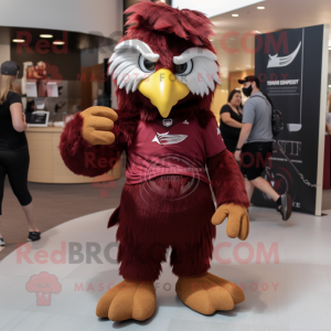 Maroon Eagle mascot costume character dressed with a Shorts and Hair clips