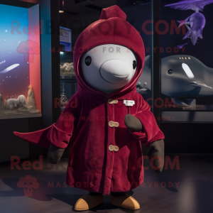Maroon Narwhal mascot costume character dressed with a Hoodie and Berets