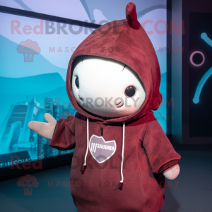 Maroon Narwhal mascot costume character dressed with a Hoodie and Berets