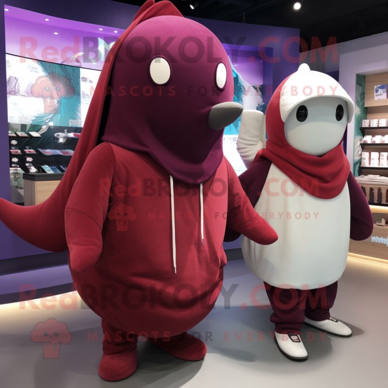 Maroon Narwhal mascot costume character dressed with a Hoodie and Berets Maroon Narwhal mascot costume character dressed with a Hoodie and Berets