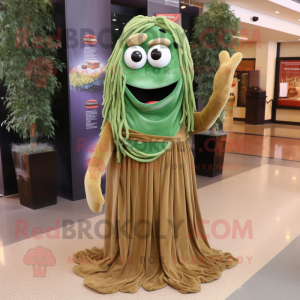 Olive Spaghetti mascot costume character dressed with a Skirt and Shawl pins