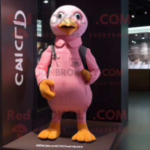 Pink Quail mascot costume character dressed with a T-Shirt and Caps