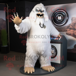 White Sasquatch mascot costume character dressed with a Polo Tee and Rings