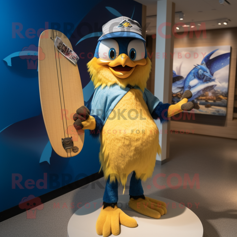 Gold Blue Jay mascot costume character dressed with a Board Shorts and Gloves