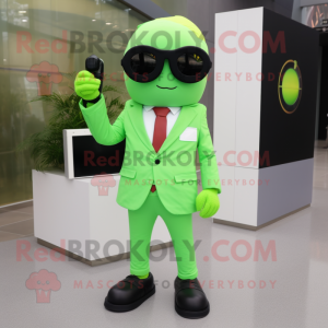 Lime Green Camera mascot costume character dressed with a Suit Pants and Sunglasses