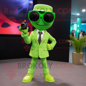 Lime Green Camera mascot costume character dressed with a Suit Pants and Sunglasses