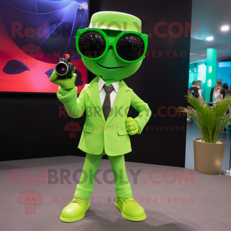 Lime Green Camera mascot costume character dressed with a Suit Pants and Sunglasses Lime Green Camera mascot costume character dressed with a Suit Pants and Sunglasses