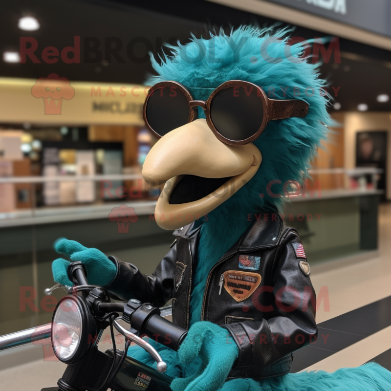 Teal Ostrich mascot costume character dressed with a Moto Jacket and Reading glasses Teal Ostrich mascot costume character dressed with a Moto Jacket and Reading glasses