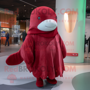 Maroon Beluga Whale mascot costume character dressed with a Sweater and Earrings