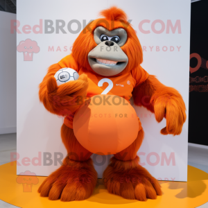 Orange Gorilla mascot costume character dressed with a Ball Gown and Smartwatches