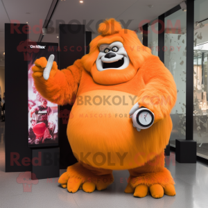 Orange Gorilla mascot costume character dressed with a Ball Gown and Smartwatches