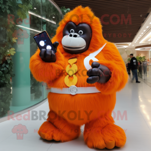Orange Gorilla mascot costume character dressed with a Ball Gown and Smartwatches