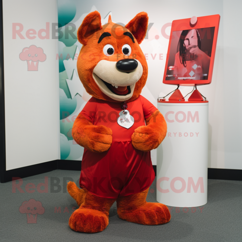 Red Dingo mascot costume character dressed with a A-Line Dress and Foot pads