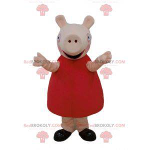 Mascota de cerdo rosa con un vestido rojo - Redbrokoly.com