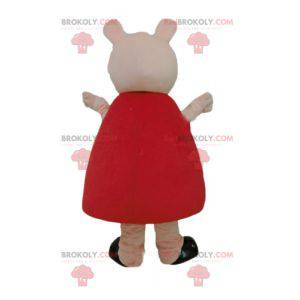 Pink pig mascot with a red dress - Redbrokoly.com